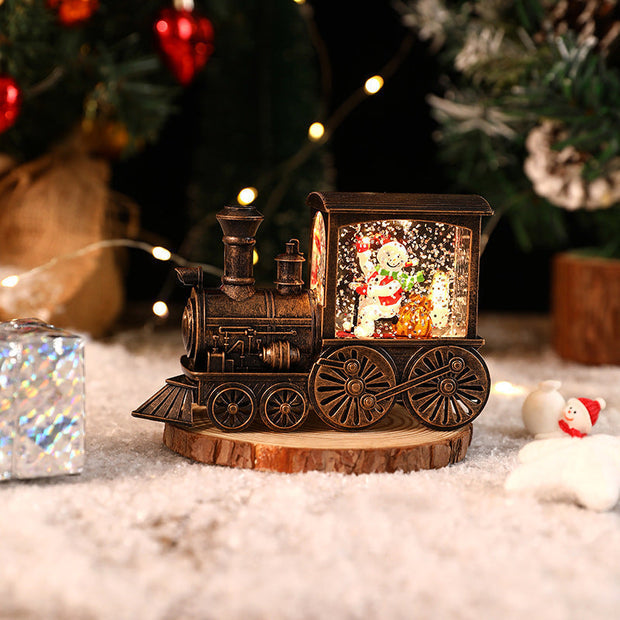 NOUVEAU RICHE Weihnachtszug mit Spieluhr – Retro Weihnachtsdeko Zug mit Weihnachtsmann, 8 Weihnachtslieder & Timer – JingleTracks Bronzefarben - Schneemann