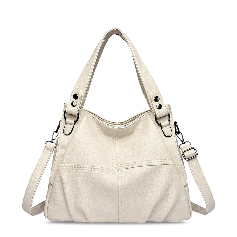 NOUVEAU RICHE Vegan Leder Handtasche Schwarz Elegante Umhängetasche Hochwertiges Accessoire für Stil und Funktionalität Gebrochenes Weiß