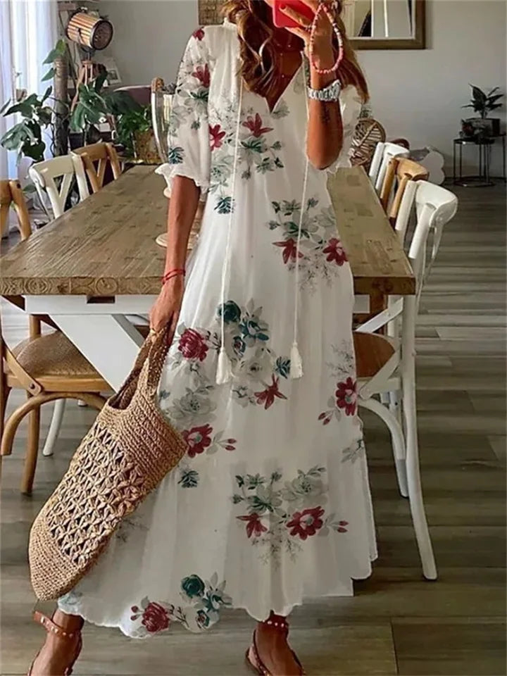 NOUVEAU RICHE Vyssion | Elegante Maxikleid mit V-Ausschnitt und Blumenmuster Weiß