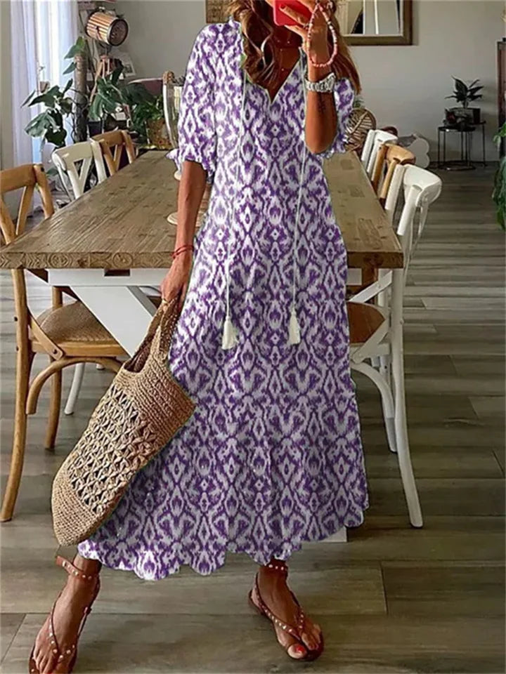 NOUVEAU RICHE Vyssion | Elegante Maxikleid mit V-Ausschnitt und Blumenmuster Lila