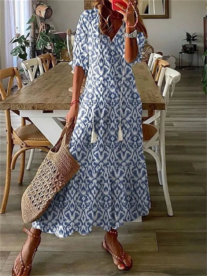 NOUVEAU RICHE Vyssion | Elegante Maxikleid mit V-Ausschnitt und Blumenmuster Blau