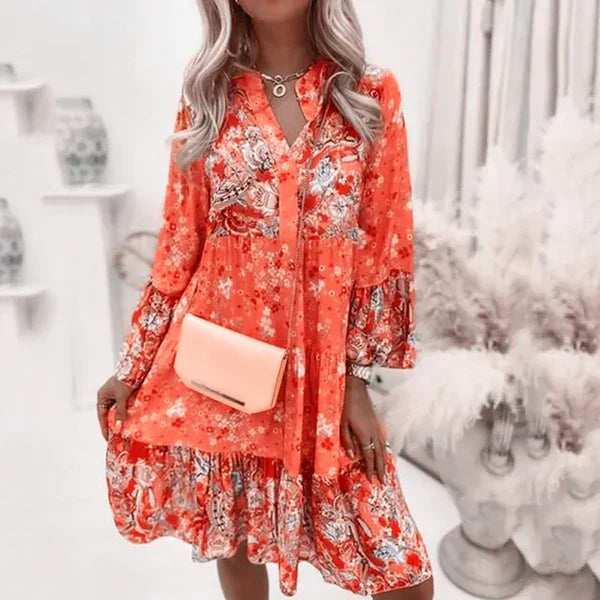NOUVEAU RICHE Estelle | Langärmelige Damenkleid mit durchgehendem Blumenprint Orange