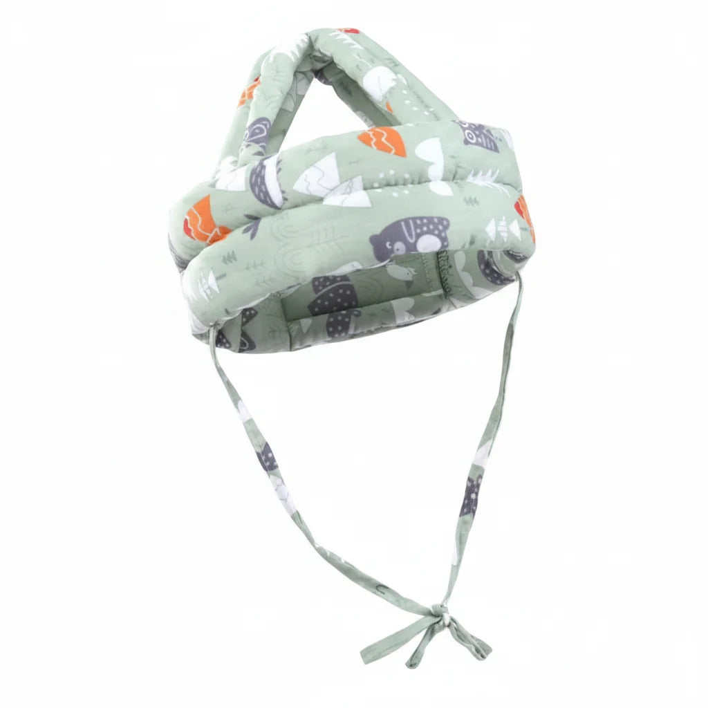 Children's headband with bear pattern on a pastel landscape background