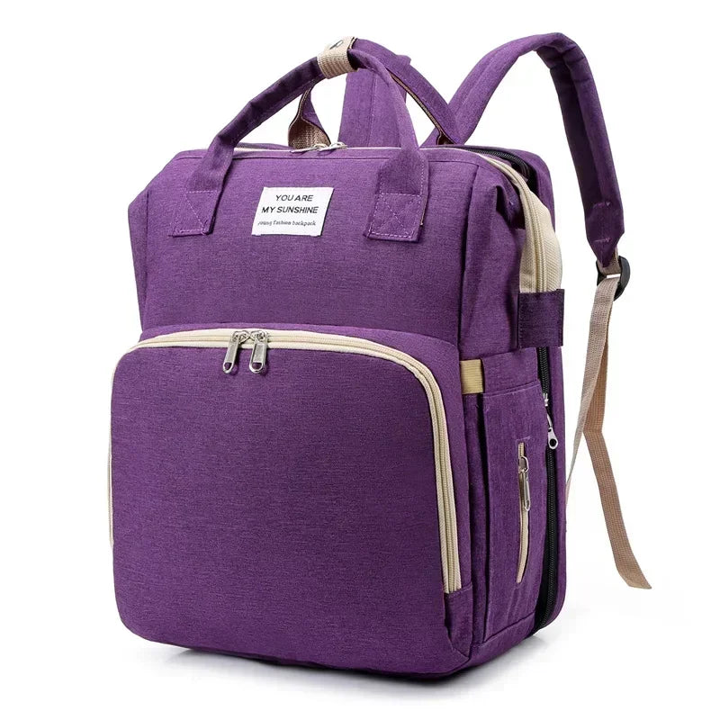 NOUVEAU RICHE Bersh | 3-in-1 Wickeltaschen-Rucksack mit Wickelstation - Faltbares Babybett & Reise-Stubenwagen Lila