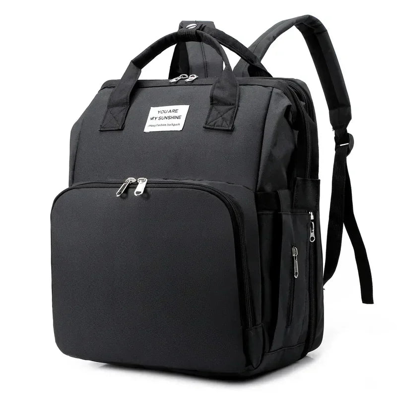 NOUVEAU RICHE Bersh | 3-in-1 Wickeltaschen-Rucksack mit Wickelstation - Faltbares Babybett & Reise-Stubenwagen Schwarz