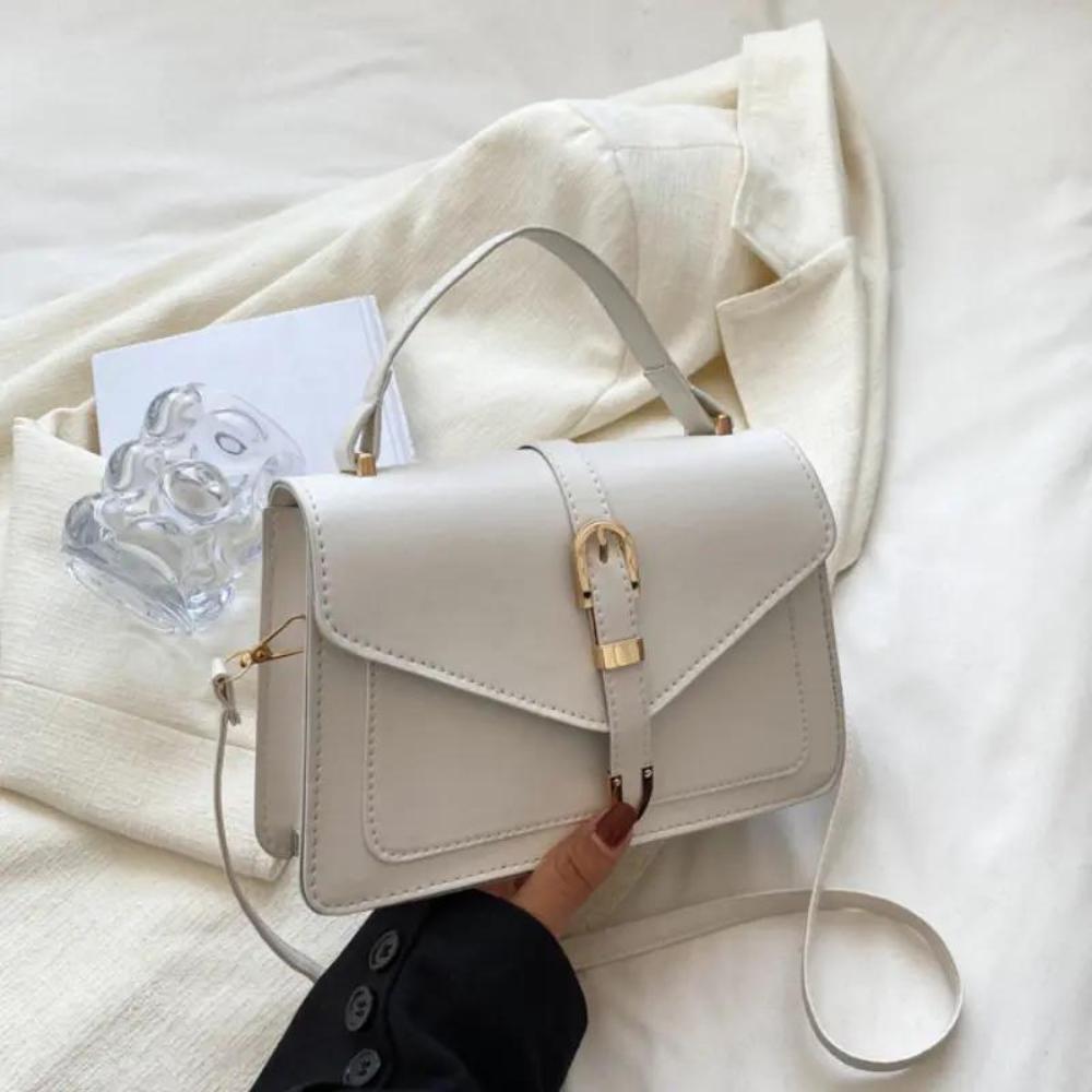 NOUVEAU RICHE Isana | Minimalistische Umhängetasche Beige