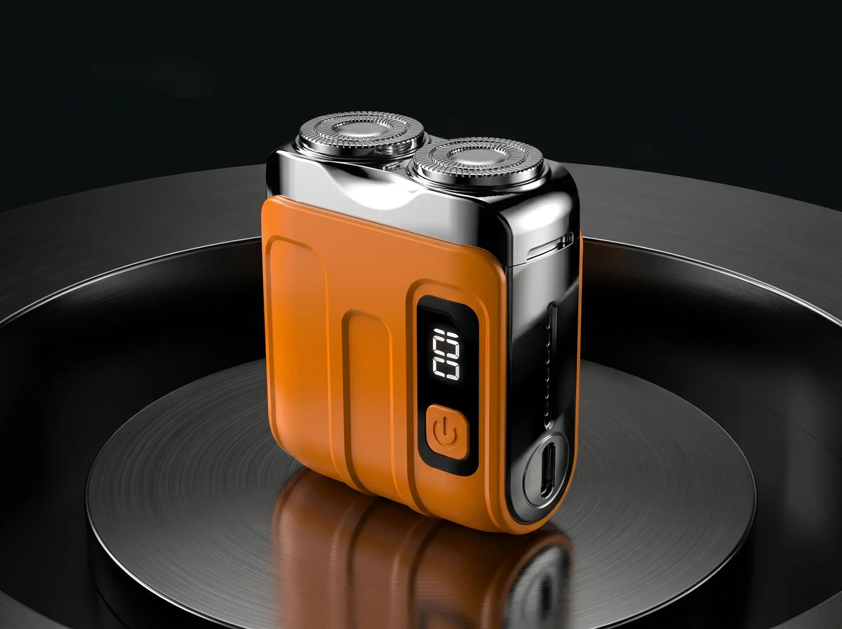 NOUVEAU RICHE Pocket Shaver – Tragbarer Elektrorasierer für Herren, Mini Reiserasierer mit USB-C Akku, Nass & Trocken, Glatte Rasur Überall Orange