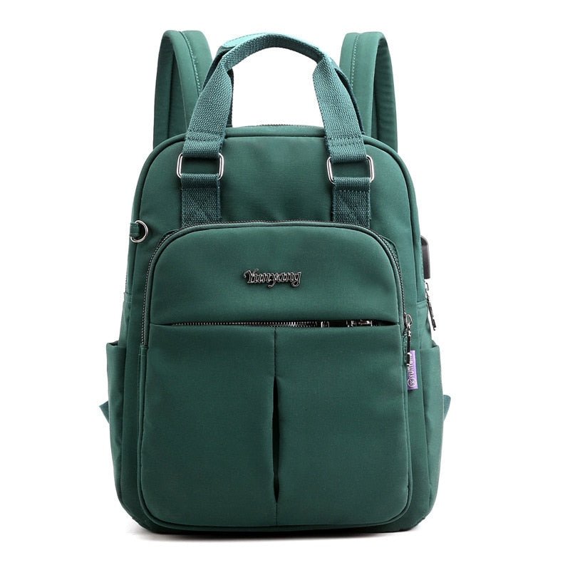 NOUVEAU RICHE Calico | Wasserabweisender USB-Lade-Rucksack mit Diebstahlschutz – Mehrfach-Fach-Design Grün