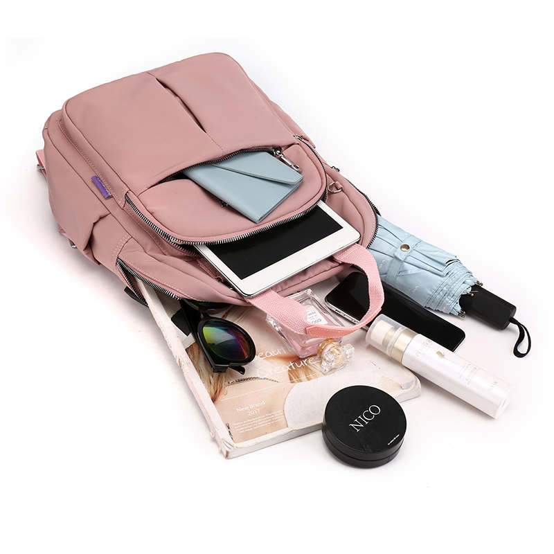 NOUVEAU RICHE Calico | Wasserabweisender USB-Lade-Rucksack mit Diebstahlschutz – Mehrfach-Fach-Design