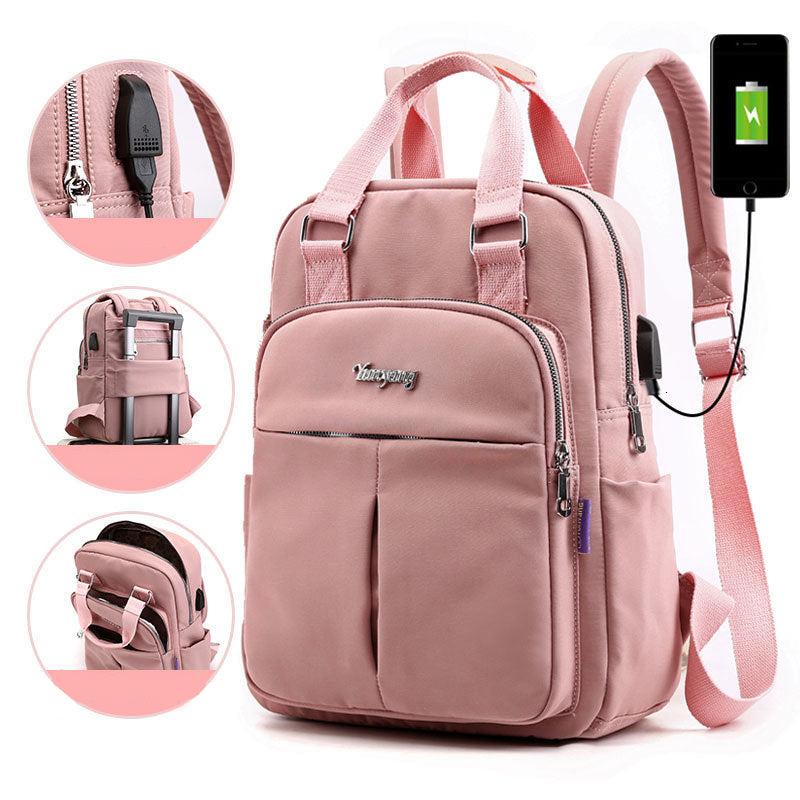 NOUVEAU RICHE Calico | Wasserabweisender USB-Lade-Rucksack mit Diebstahlschutz – Mehrfach-Fach-Design Pink