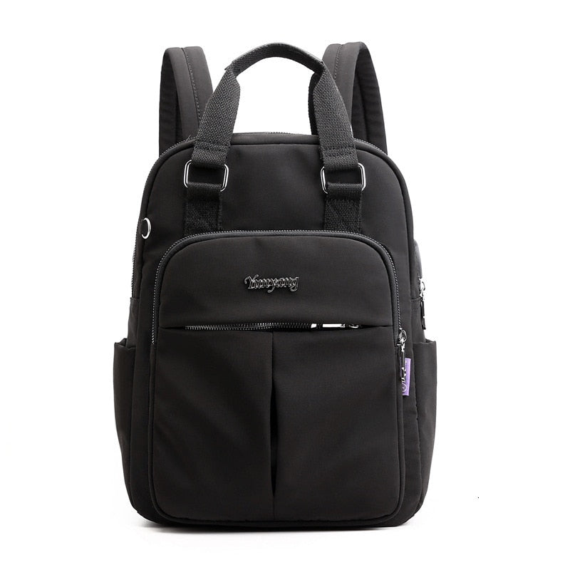 NOUVEAU RICHE Calico | Wasserabweisender USB-Lade-Rucksack mit Diebstahlschutz – Mehrfach-Fach-Design Schwarz