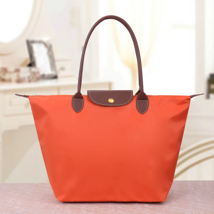 NOUVEAU RICHE Damen Luxe Oxford Schultertasche Oxnard Elegante Begleiter Orange